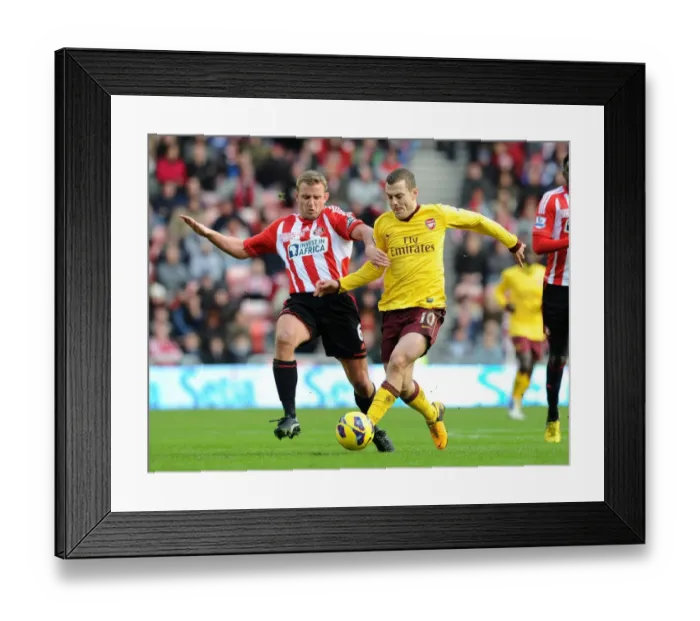 Framed Print : Jack Wilshere vs. Lee Catermole: Battle in the Midfield - Sunderland vs. Arsenal, Premier League 2012-13