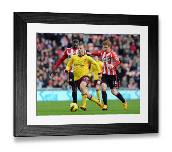 Framed Print : Jack Wilshere Drives Past Sunderland's Diaye and Colback Framed Print : Jack Wilshere Drives Past Sunderland's Diaye and Colback