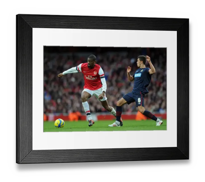 Framed Print : Abou Diaby Outmaneuvers Jason Lowe in FA Cup Clash: Arsenal vs. Blackburn Rovers