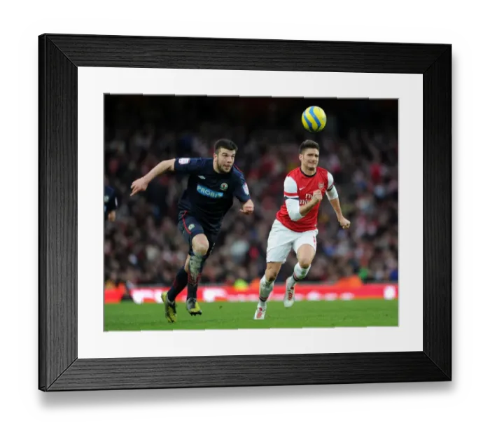 Framed Print : Arsenal's Olivier Giroud Chases Down Blackburn's Grant Hanley in FA Cup Clash