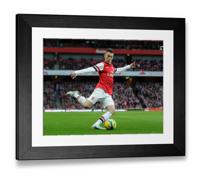 Framed Print : Arsenal's Laurent Koscielny in FA Cup Action against Blackburn Rovers Framed Print : Arsenal's Laurent Koscielny in FA Cup Action against Blackburn Rovers