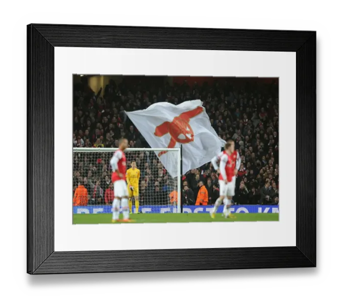 Framed Print : Flags waved in the stadium. Arsenal 1: 3 Bayern Munich. UEFA Champions League. Round of 16, 1st Leg