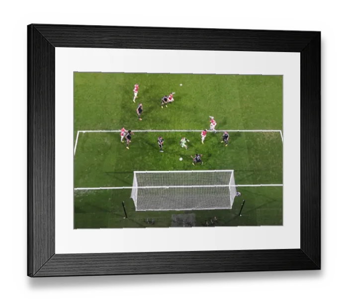 Framed Print : Lukas Podolski scores Arsenals goal past Manuel Neuer (Bayern). Arsenal 1: 3 Bayern Munich Framed Print : Lukas Podolski scores Arsenals goal past Manuel Neuer (Bayern). Arsenal 1: 3 Bayern Munich