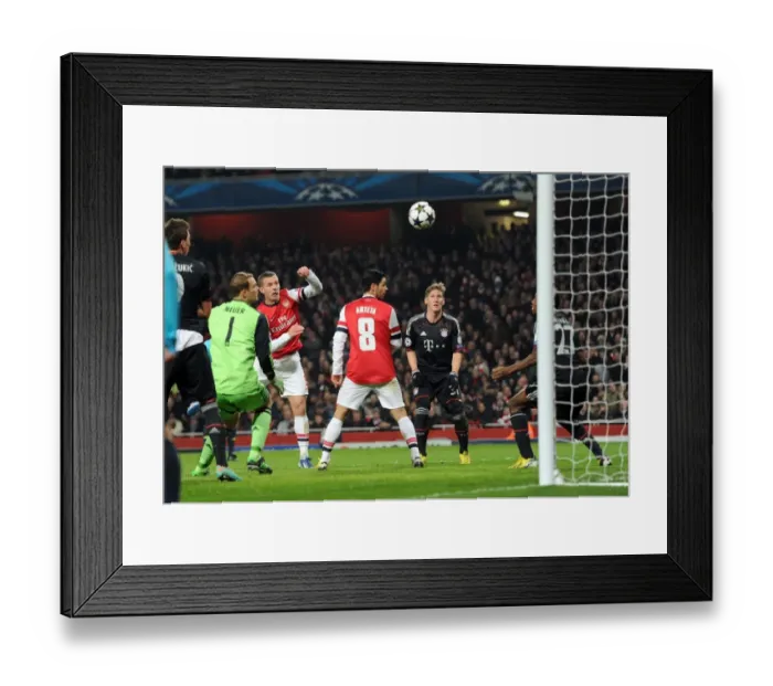 Framed Print : Lukas Podolski Scores Stunning Header Against Manuel Neuer and David Alaba in Arsenal vs. Bayern Munich UCL Clash Framed Print : Lukas Podolski Scores Stunning Header Against Manuel Neuer and David Alaba in Arsenal vs. Bayern Munich UCL Clash