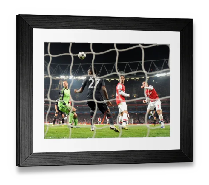 Framed Print : Lukas Podolski Scores Stunner: Arsenal vs. Bayern Munich, Champions League 2012-13