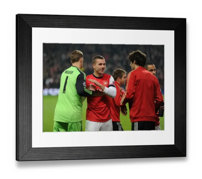 Framed Print : Lukas Podolski and Manuel Neuer - A Moment of Sportsmanship Before the Arsenal v Bayern Munich UEFA Champions League Clash Framed Print : Lukas Podolski and Manuel Neuer - A Moment of Sportsmanship Before the Arsenal v Bayern Munich UEFA Champions League Clash