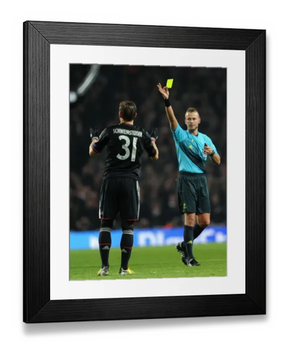 Framed Print : Arsenal vs. Bayern Munich: Referee Shows Yellow Card to Bastian Schweinsteiger in Champions League Clash Framed Print : Arsenal vs. Bayern Munich: Referee Shows Yellow Card to Bastian Schweinsteiger in Champions League Clash
