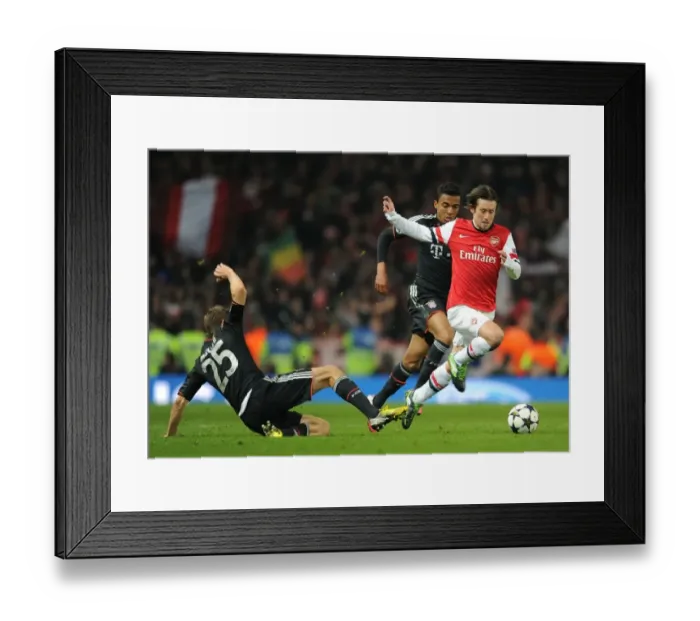 Framed Print : Arsenal's Tomas Rosicky Outmaneuvers Bayern's Gustavo and Muller in Champions League Showdown