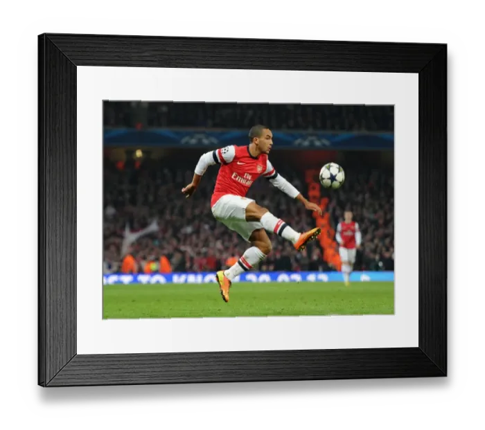 Framed Print : Theo Walcott in Action: Arsenal vs. FC Bayern Munich, UEFA Champions League 2012-13