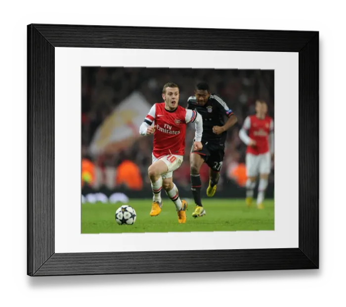 Framed Print : Jack Wilshere (Arsenal) David Alaba (Bayern). Arsenal 1: 3 Bayern Munich. UEFA Champions League Framed Print : Jack Wilshere (Arsenal) David Alaba (Bayern). Arsenal 1: 3 Bayern Munich. UEFA Champions League
