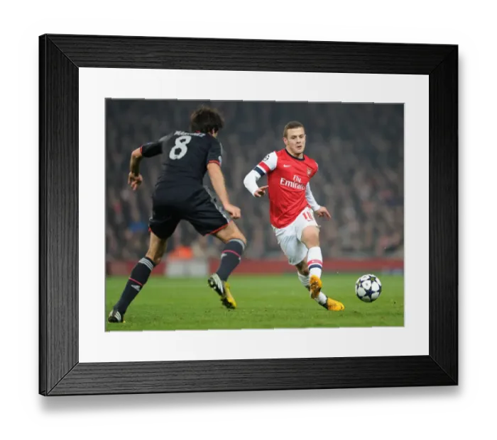 Framed Print : Arsenal's Jack Wilshere vs Bayern Munchen's Javi Martinez: A Battle of Midfield Maestros in the Champions League