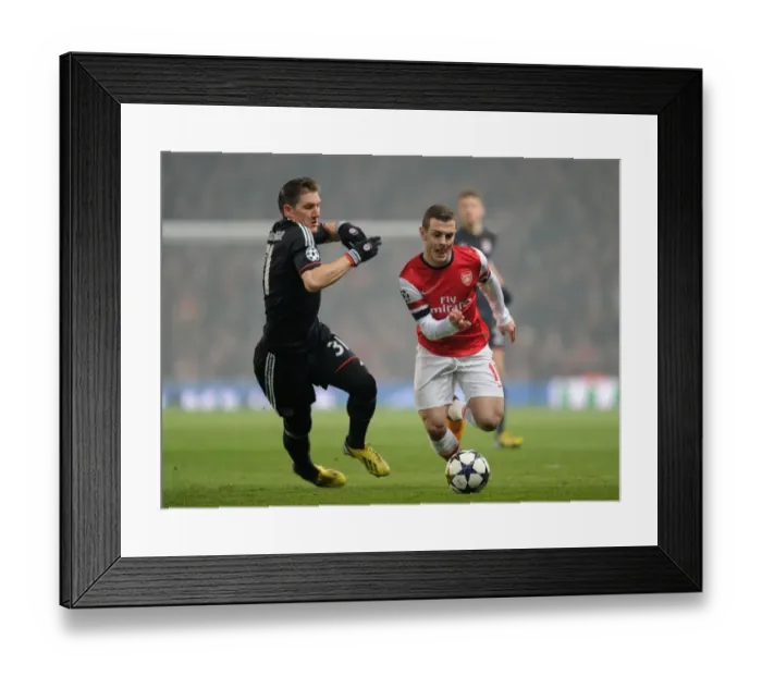 Framed Print : Clash of Midfield Titans: Jack Wilshere vs Bastian Schweinsteiger (Arsenal v Bayern Munich, 2013)