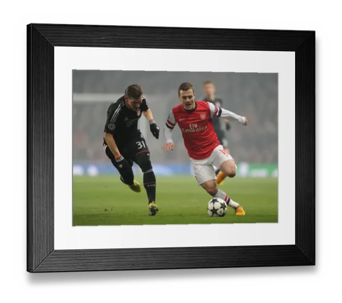 Framed Print : Clash of Midfield Titans: Wilshere vs Schweinsteiger (Arsenal vs Bayern Munich, 2013 Champions League)