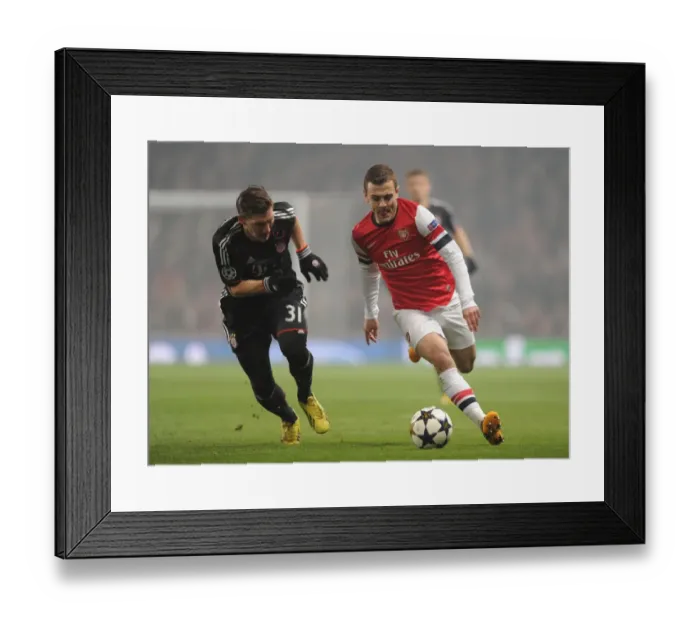Framed Print : Clash of Midfield Titans: Wilshere vs. Schweinsteiger (Arsenal vs. Bayern Munich, 2013) Framed Print : Clash of Midfield Titans: Wilshere vs. Schweinsteiger (Arsenal vs. Bayern Munich, 2013)