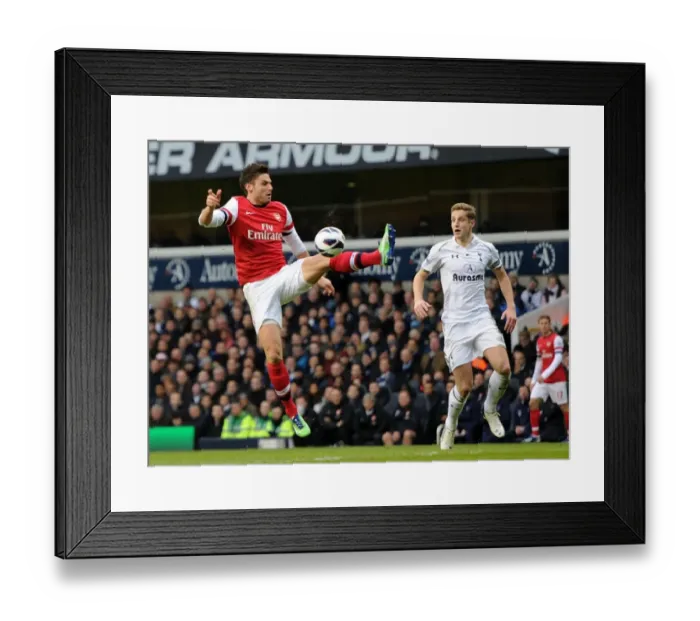 Framed Print : Intense Rivalry: Giroud vs Dawson at White Hart Lane - Arsenal vs Tottenham, Premier League 2012-13