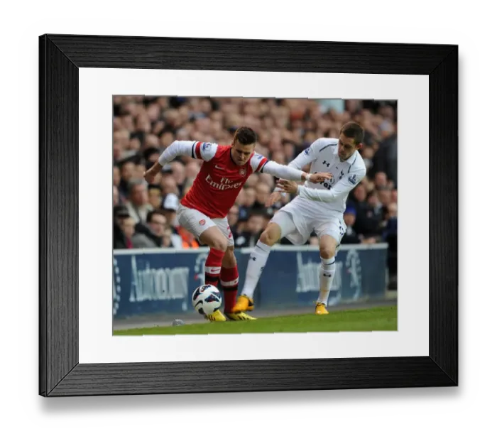 Framed Print : Jenkinson Fouls Sigurdsson: Intense Rivalry in Tottenham Hotspur vs Arsenal Premier League Clash
