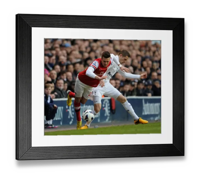Framed Print : Jenkinson Fouls by Sigurdsson: Tottenham vs. Arsenal, Premier League 2012-13 Framed Print : Jenkinson Fouls by Sigurdsson: Tottenham vs. Arsenal, Premier League 2012-13