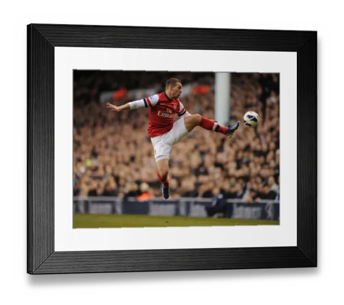 Framed Print : Lukas Podolski Faces Off: Tottenham Hotspur vs. Arsenal, Premier League 2012-13 Framed Print : Lukas Podolski Faces Off: Tottenham Hotspur vs. Arsenal, Premier League 2012-13