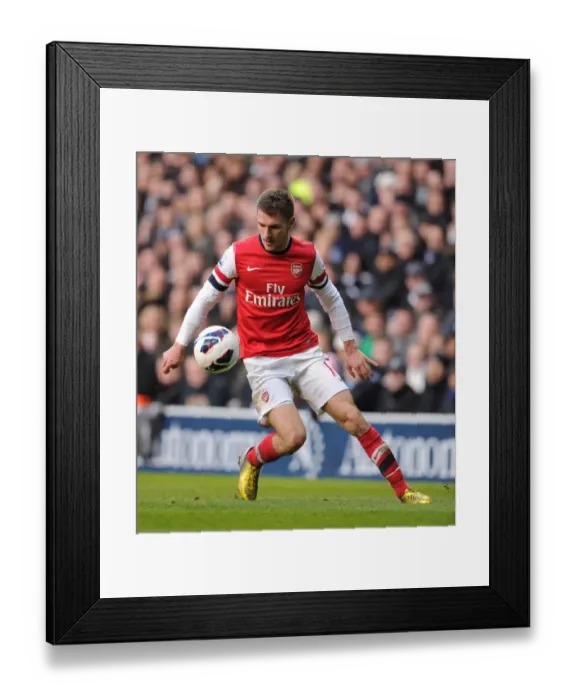 Framed Print : Aaron Ramsey in Action: Arsenal vs. Tottenham Rivalry, Premier League 2012-13