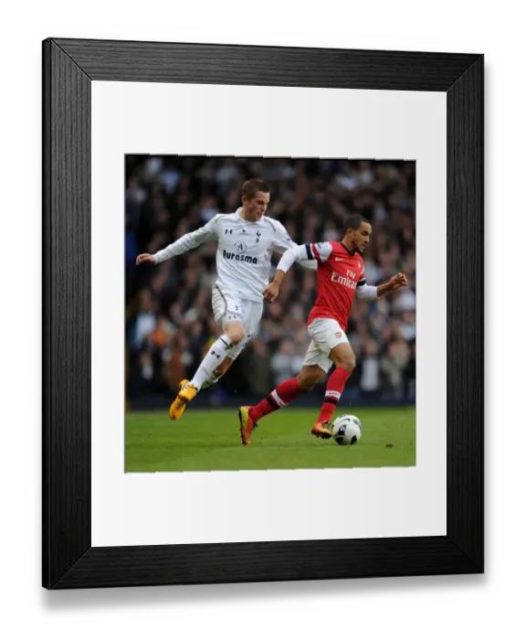 Framed Print : Theo Walcott vs. Gylfi Sigurdsson: Clash of the Wings in the Premier League (Tottenham Hotspur v Arsenal, 2012-13) Framed Print : Theo Walcott vs. Gylfi Sigurdsson: Clash of the Wings in the Premier League (Tottenham Hotspur v Arsenal, 2012-13)