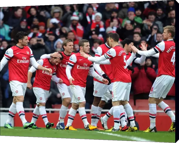 Santi Cazorla celebrates scoring Arsenals 1st goal with his team mates. Arsenal 2: 1 Aston Villa