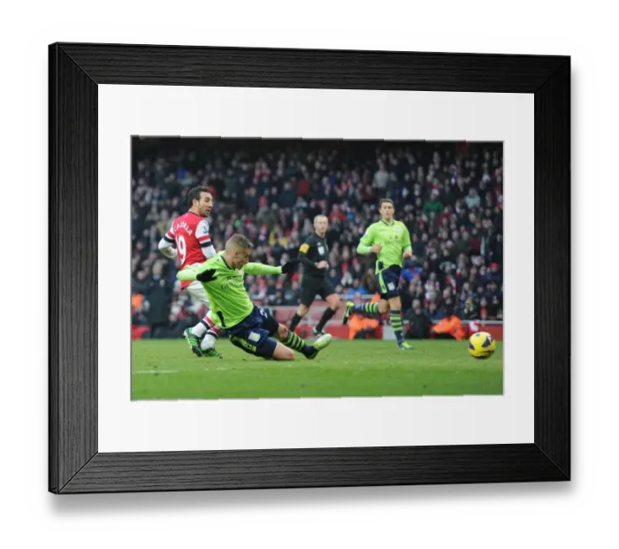 Framed Print : Santi Cazorla Scores Under Pressure: Arsenal vs Aston Villa, Premier League 2012-13 Framed Print : Santi Cazorla Scores Under Pressure: Arsenal vs Aston Villa, Premier League 2012-13
