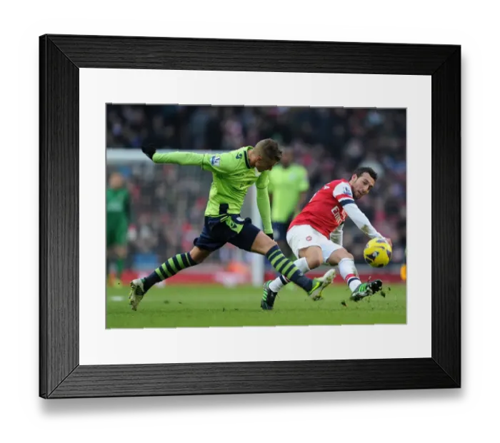 Framed Print : Santi Cazorla vs Joe Bennett: Intense Battle for Ball Possession - Arsenal v Aston Villa (2012-13) Framed Print : Santi Cazorla vs Joe Bennett: Intense Battle for Ball Possession - Arsenal v Aston Villa (2012-13)