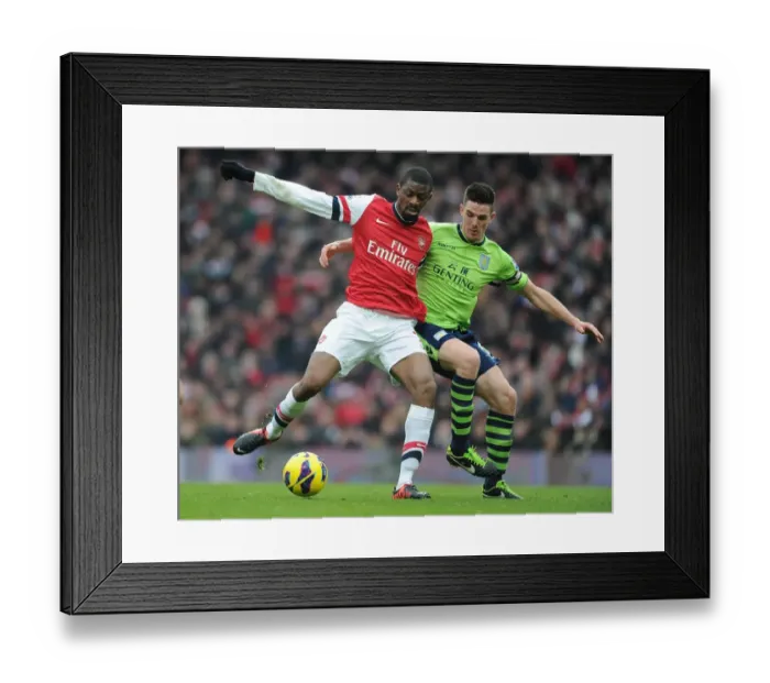 Framed Print : Clash at Emirates: A Battle for Midfield Supremacy - Abou Diaby vs. Ciaran Clark Framed Print : Clash at Emirates: A Battle for Midfield Supremacy - Abou Diaby vs. Ciaran Clark