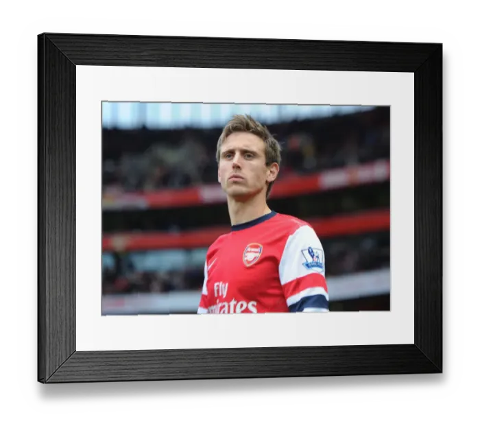 Framed Print : Nacho Monreal: Arsenal's Focused Defender Ahead of Arsenal v Aston Villa (2012-13)