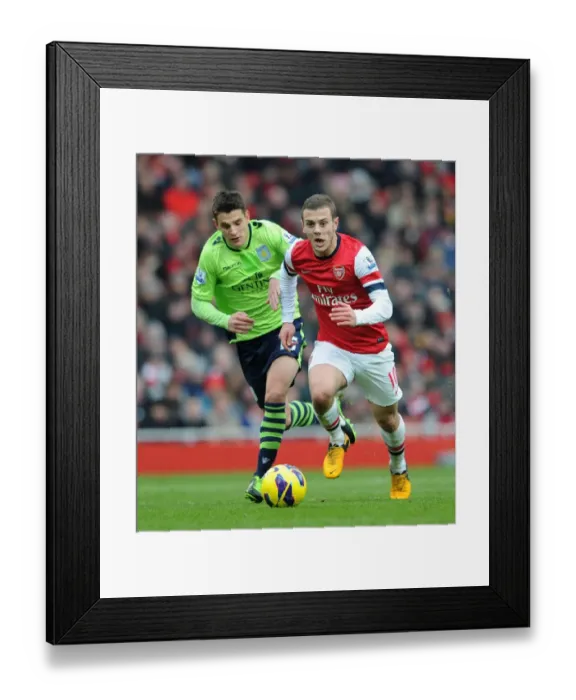 Framed Print : Jack Wilshere's Agile Past: Outmaneuvering Ashley Westwood, Arsenal vs Aston Villa, Premier League 2012-13 Framed Print : Jack Wilshere's Agile Past: Outmaneuvering Ashley Westwood, Arsenal vs Aston Villa, Premier League 2012-13