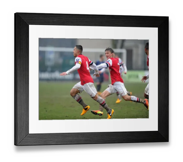 Framed Print : Nico Yennaris Scores the Winning Goal for Arsenal U19 against Inter Milan U19 in the NextGen Series: A Celebratory Moment with Kris Olsson