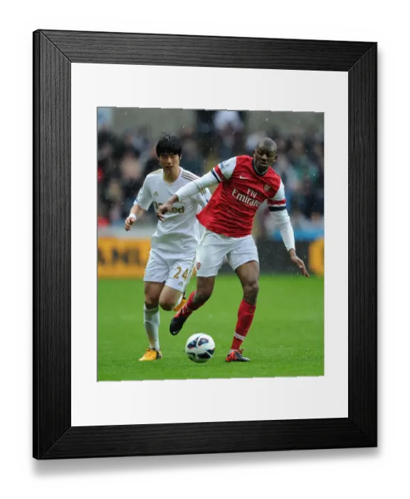 Framed Print : Abou Diaby's Premier League Masterclass: Outmaneuvering Ki Sung-Yueng (Swansea City vs. Arsenal, 2013) Framed Print : Abou Diaby's Premier League Masterclass: Outmaneuvering Ki Sung-Yueng (Swansea City vs. Arsenal, 2013)