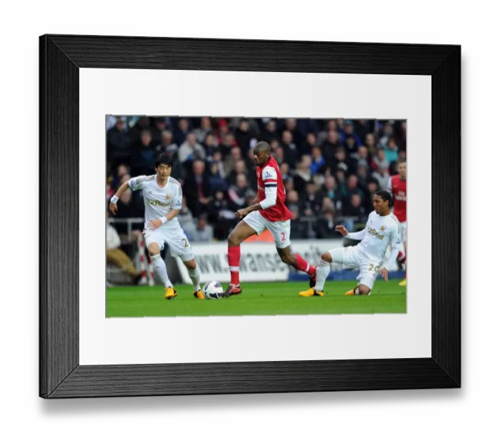 Framed Print : Clash of Midfielders: Abou Diaby vs. Ki Sung-Yueng and Jonathan De Guzman (Swansea City vs. Arsenal, 2012-13) Framed Print : Clash of Midfielders: Abou Diaby vs. Ki Sung-Yueng and Jonathan De Guzman (Swansea City vs. Arsenal, 2012-13)