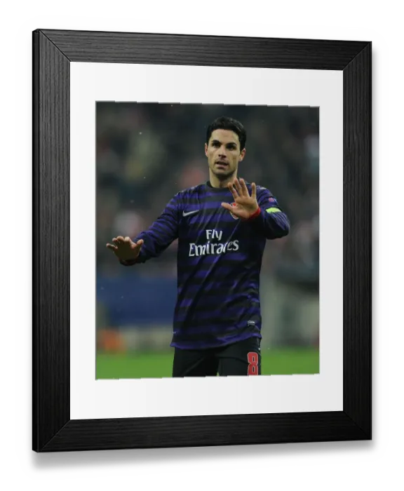 Framed Print : Mikel Arteta: Leading Arsenal Against Bayern Munchen in the UEFA Champions League (2012-13)