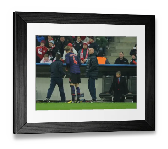 Framed Print : Arsenal's Bould Coaches Mertesacker Amidst Bayern Munich Tension (UEFA Champions League 2012-13) Framed Print : Arsenal's Bould Coaches Mertesacker Amidst Bayern Munich Tension (UEFA Champions League 2012-13)