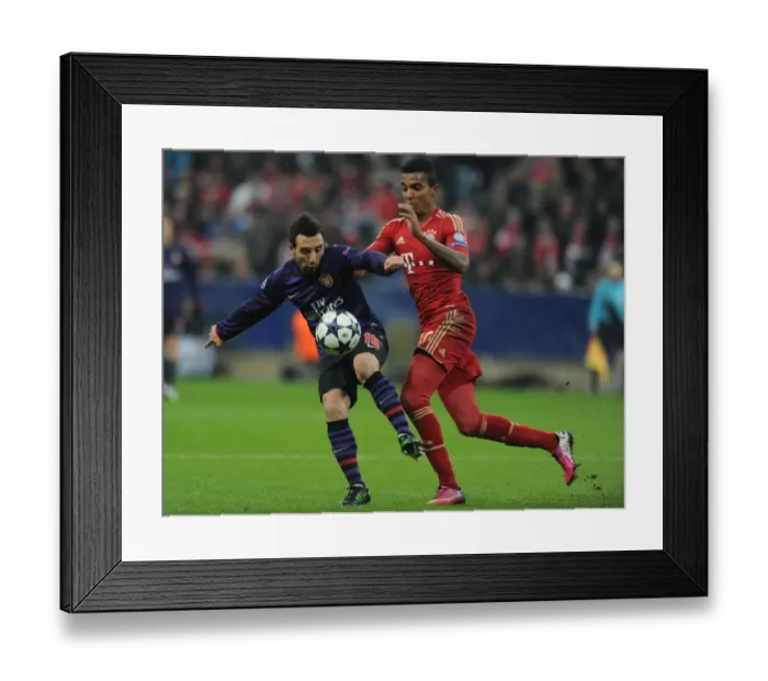 Framed Print : Clash of Midfield Titans: Santi Cazorla vs. Luiz Gustavo - Arsenal vs. Bayern Munich, UEFA Champions League 2013