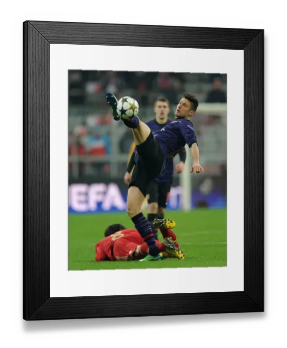 Framed Print : Clash of Titans: Olivier Giroud vs Javier Martinez - Bayern Munich vs Arsenal, UEFA Champions League 2013