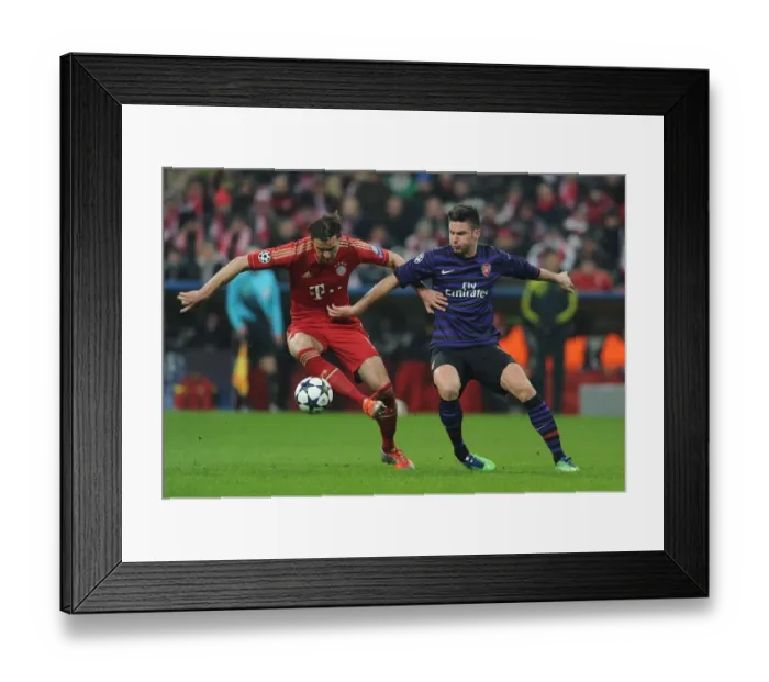 Framed Print : Clash of Titans: Giroud vs. Van Buyten - Arsenal vs. Bayern Munich, UEFA Champions League 2013