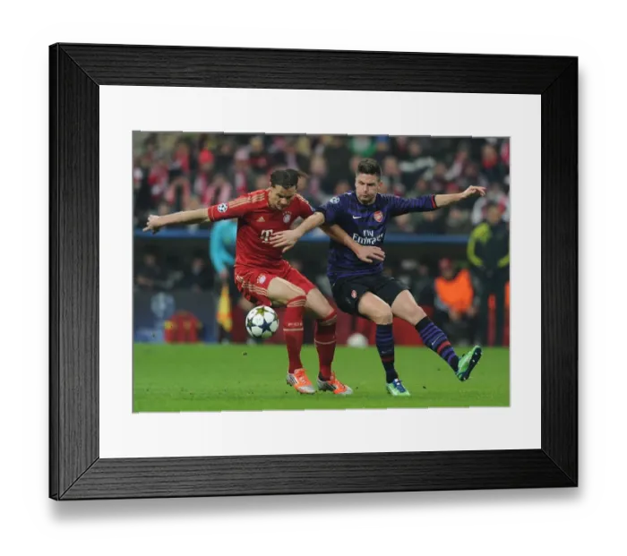 Framed Print : Clash of Titans: Giroud vs. Van Buyten - Arsenal vs. Bayern Munich, UEFA Champions League 2013