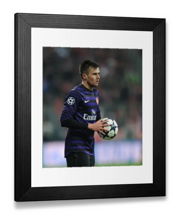 Framed Print : Carl Jenkinson's Defiant Stand: Arsenal vs. Bayern Munich in the 2012-13 UEFA Champions League Framed Print : Carl Jenkinson's Defiant Stand: Arsenal vs. Bayern Munich in the 2012-13 UEFA Champions League