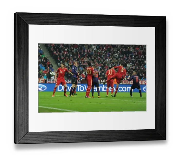 Framed Print : Koscielny's Stunning Header: Arsenal Stuns Bayern Munich in Champions League Framed Print : Koscielny's Stunning Header: Arsenal Stuns Bayern Munich in Champions League