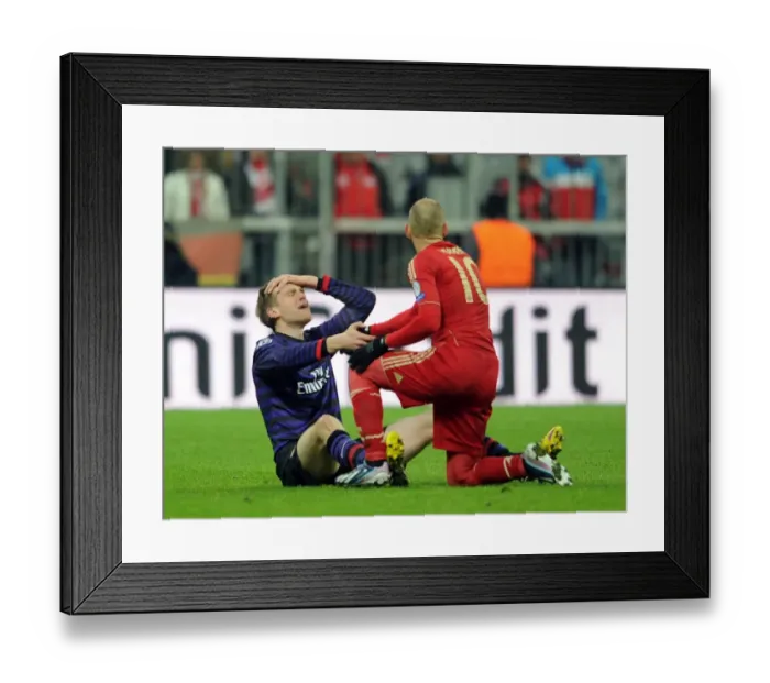 Framed Print : Per Mertesacker and Arjen Robben: Unbelievable Moment in the UEFA Champions League Clash between Bayern Munich and Arsenal FC