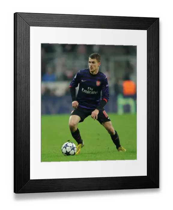 Framed Print : Aaron Ramsey in Action: Bayern Munich vs. Arsenal, UEFA Champions League 2012-13