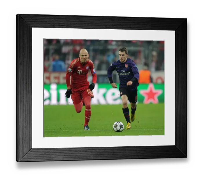 Framed Print : Clash of Stars: Ramsey vs. Robben - UEFA Champions League 2013: Arsenal's Ramsey Goes Head-to-Head with Bayern's Robben Framed Print : Clash of Stars: Ramsey vs. Robben - UEFA Champions League 2013: Arsenal's Ramsey Goes Head-to-Head with Bayern's Robben