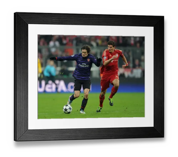 Framed Print : Clash of Stars: Rosicky vs. Gomez in Bayern Munich vs. Arsenal UEFA Champions League Showdown