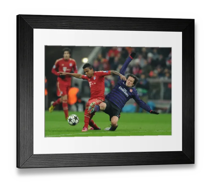 Framed Print : Clash of Midfield Giants: Rosicky vs. Gustavo in Bayern Munich vs. Arsenal UEFA Champions League Showdown