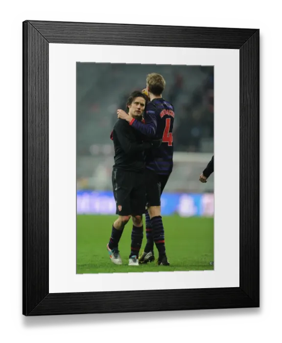 Framed Print : Arsenal's Rosicky and Mertesacker: Defeated Faces after Bayern Munich Clash in Champions League