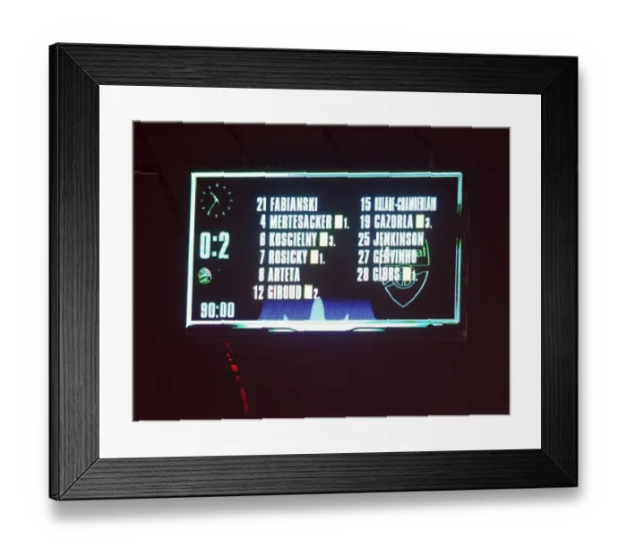 Framed Print : Champions League Showdown: Arsenal FC vs. FC Bayern Munich - Scoreboard Moment (2012-2013)
