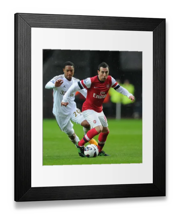 Framed Print : Santi Cazorla Outmaneuvers Jonathan de Guzman: Swansea City vs Arsenal, Premier League 2012-13