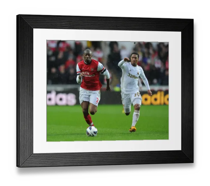 Framed Print : Abou Diaby Outmaneuvers Jonathan de Guzman: Swansea City vs. Arsenal, Premier League 2012-13 Framed Print : Abou Diaby Outmaneuvers Jonathan de Guzman: Swansea City vs. Arsenal, Premier League 2012-13